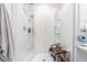 Modern bathroom with a large walk-in shower and built-in shelves at 2714 Chestnut Creek Pl, Brandon, FL 33510