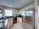 Kitchen boasts stainless steel appliances and ample cabinet space at 604 Masterpiece Dr # 604, Sun City Center, FL 33573