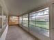 Peaceful screened porch overlooking the backyard at 604 Masterpiece Dr # 604, Sun City Center, FL 33573
