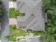 Property overview showing roofline and landscaping at 604 Masterpiece Dr # 604, Sun City Center, FL 33573