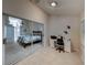 Bright home office features built-in desk and view into bedroom at 604 Masterpiece Dr # 604, Sun City Center, FL 33573