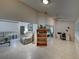 Home office with built-in shelving and ample natural light at 604 Masterpiece Dr # 604, Sun City Center, FL 33573