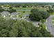 Aerial view showcasing home location in a tranquil golf course community at 604 Masterpiece Dr # 604, Sun City Center, FL 33573