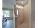 Bright and airy entryway with tile floors and access to living spaces at 604 Masterpiece Dr # 604, Sun City Center, FL 33573
