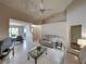 Spacious living room with vaulted ceilings and neutral tones at 604 Masterpiece Dr # 604, Sun City Center, FL 33573