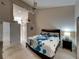 Spacious bedroom with carpeted floor and ceiling fan at 604 Masterpiece Dr # 604, Sun City Center, FL 33573