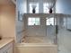 Bathroom with soaking tub, shower and large windows at 604 Masterpiece Dr # 604, Sun City Center, FL 33573