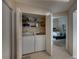 Convenient laundry room with washer and dryer at 604 Masterpiece Dr # 604, Sun City Center, FL 33573
