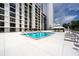Refreshing pool area with surrounding lounge chairs at 707 S Gulfstream Ave # 602, Sarasota, FL 34236