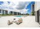 Inviting pool area with lounge chairs and a gazebo at 707 S Gulfstream Ave # 602, Sarasota, FL 34236
