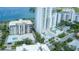 Aerial view of condo buildings and a pool at 707 S Gulfstream Ave # 602, Sarasota, FL 34236