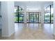 Lobby with tiled flooring, large windows, and access to the outdoors at 707 S Gulfstream Ave # 602, Sarasota, FL 34236
