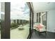 Condo view showcasing a pool, gazebo, and surrounding buildings at 707 S Gulfstream Ave # 602, Sarasota, FL 34236