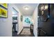 Entryway with kitchen and wall art at 707 S Gulfstream Ave # 602, Sarasota, FL 34236