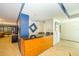 Community wet bar with granite countertop and wood cabinetry at 707 S Gulfstream Ave # 602, Sarasota, FL 34236