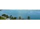 Waterfront view with sailboats and palm trees at 707 S Gulfstream Ave # 602, Sarasota, FL 34236