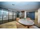 Community game room with a round table and chairs at 707 S Gulfstream Ave # 602, Sarasota, FL 34236
