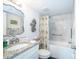 Relaxing bathroom with a bathtub and shower, plus granite vanity at 707 S Gulfstream Ave # 602, Sarasota, FL 34236