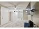 Bright bonus room with ample closet space and ceiling fan at 240 Windward Psge # 605, Clearwater Beach, FL 33767