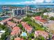 Aerial view of community with waterfront access and resort-style amenities at 240 Windward Psge # 605, Clearwater Beach, FL 33767