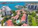 Aerial view of community, showing building arrangement and waterfront access at 240 Windward Psge # 605, Clearwater Beach, FL 33767