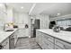 Recently updated kitchen with white cabinets and quartz countertops at 240 Windward Psge # 605, Clearwater Beach, FL 33767