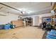 Garage with shelving for storage and an attached door at 240 Windward Psge # 605, Clearwater Beach, FL 33767