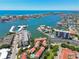 Aerial view of the community, highlighting its prime waterfront location at 240 Windward Psge # 605, Clearwater Beach, FL 33767