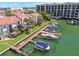 Community boasts private boat docks and serene waterfront views at 240 Windward Psge # 605, Clearwater Beach, FL 33767