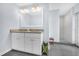 Double vanity bathroom with granite countertops at 1129 Danny Dr, Sarasota, FL 34243