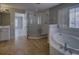 Elegant bathroom featuring a separate shower and tub, complemented by neutral tile flooring and modern fixtures at 19334 Autumn Woods Ave, Tampa, FL 33647