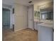 Spacious bathroom featuring double sink vanity and separate shower area at 19334 Autumn Woods Ave, Tampa, FL 33647