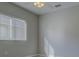 Bright bedroom with a ceiling fan and a window with horizontal blinds at 19334 Autumn Woods Ave, Tampa, FL 33647
