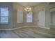 Dining room features neutral walls, laminate flooring, and natural lighting at 19334 Autumn Woods Ave, Tampa, FL 33647