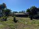 Large backyard with home partially visible at 33255 State Road 70 E, Myakka City, FL 34251