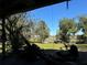 View of backyard and water from carport at 33255 State Road 70 E, Myakka City, FL 34251