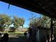 Backyard view from under covered structure at 33255 State Road 70 E, Myakka City, FL 34251
