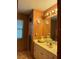 Bathroom with a single sink vanity and shower at 33255 State Road 70 E, Myakka City, FL 34251