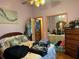 Bedroom with double bed and wooden dresser at 33255 State Road 70 E, Myakka City, FL 34251