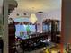 Elegant dining room with chandelier and china cabinet at 33255 State Road 70 E, Myakka City, FL 34251