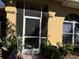 Front entrance with a screened-in porch at 33255 State Road 70 E, Myakka City, FL 34251