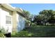 Side view of the house showcasing a large backyard at 33255 State Road 70 E, Myakka City, FL 34251
