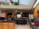 Kitchen with island, dining area, and living room view at 33255 State Road 70 E, Myakka City, FL 34251