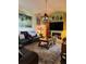 Living Room with leather couches and a fireplace at 33255 State Road 70 E, Myakka City, FL 34251