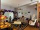 Living Room with hardwood floors, comfortable seating, and large windows at 33255 State Road 70 E, Myakka City, FL 34251