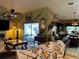 Living room with access to the pool area at 33255 State Road 70 E, Myakka City, FL 34251