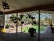 View of the pool area from inside the house at 33255 State Road 70 E, Myakka City, FL 34251