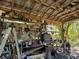 Covered workshop with various tools and equipment at 33255 State Road 70 E, Myakka City, FL 34251