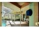 Bright screened patio with pool view at 33255 State Road 70 E, Myakka City, FL 34251