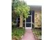 Front entry with screen door and walkway at 33255 State Road 70 E, Myakka City, FL 34251